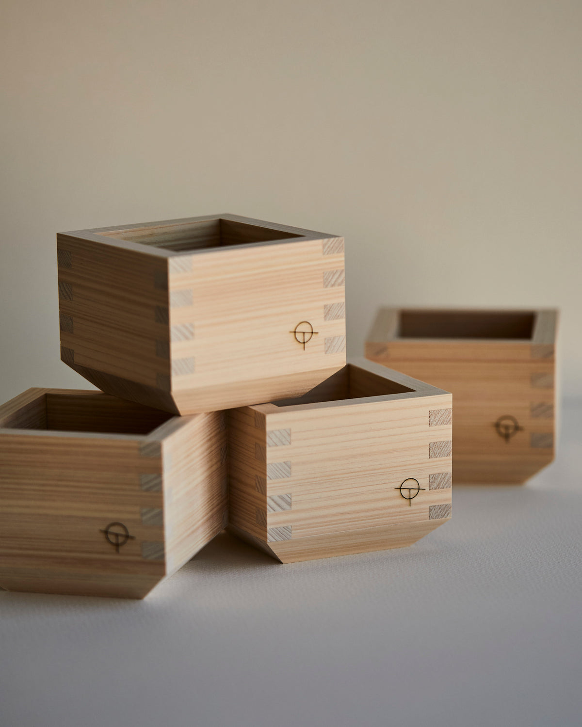 Group of Hinoki sake cups, one pair stacked
